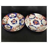 Pair of painted decorative plates