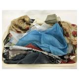 Basket of assorted thin fashion scarves