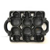 Cast iron snowman mold