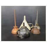 Vintage tiny oil can collection