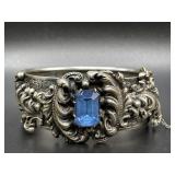 Sterling silver ornate cuff bracelet w/ blue stone