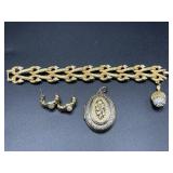 Trio of gold tone jewelry with bracelet
