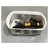 Plastic basket of assorted tools
