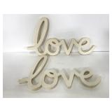 Two wooden "Love" word cut outs for DIY