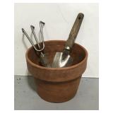 Terracotta planter and garden tool combo