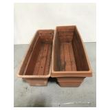 Pair of cantaloupe outdoor boots planters