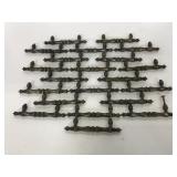 Collection of 21 matching drawer pulls