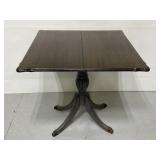Antique clawfoot convertible wood table