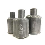 Trio of vintage etched metal bottles