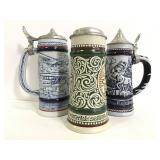 Three vintage Avon steins