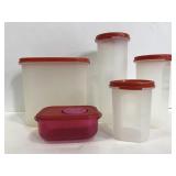Five Tupperware containers with lids