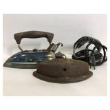 Vintage electric irons and sad iron piece