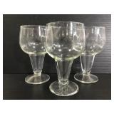 Trio of open stem wine glasses