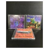 Trio of assorted sealed CDs