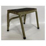 Old metal step stool w/ rubber grip top