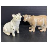 Cow in boots & happy piggy statues