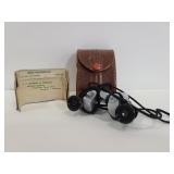 Small Bushnell metal binoculars with case
