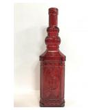 Tall red glass cathedral bottle