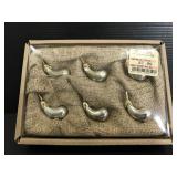 Set of six metal eggplant knife rests