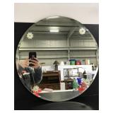 Round mirror with flower accents