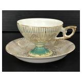 Iridescent flower teacup and saucer