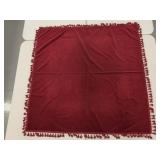 Dark red velvet tablecloth with tassels