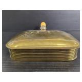 Brass warmer with bakelite handle