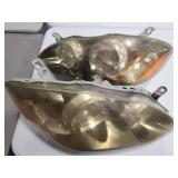 Two vehicle headlights