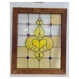 Framed stained glass window