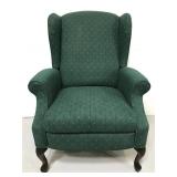 Vintage green upholstered wing back chair