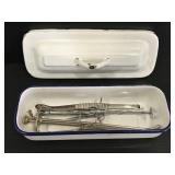 Vintage ophthalmology tools in enameled tray