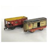 Pair of antique model railroad toy train cars