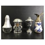 Four vintage salt and pepper shakers