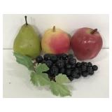 Four pieces of faux fruit decor