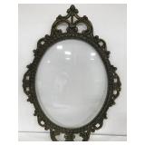 Gilded frame with bubble glass