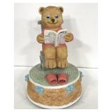 Resin bear in rocker music melody player