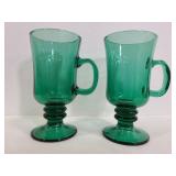 Two green glass gold rim Irish coffee mugs