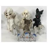 Seven ceramic doggie statuettes