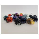 Twenty-one plastic NFL mini helmets