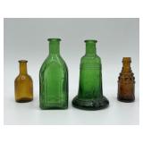 Four assorted miniature glass bottles