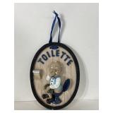 Toilette humor chalkware wall plaque