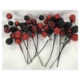 Ten red and black sparkly stripe ball picks