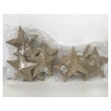 Ten paper mache star ornaments