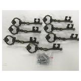 Seven metal key shaped drawer pulls