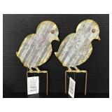 Two metal chick yard stakes with tags