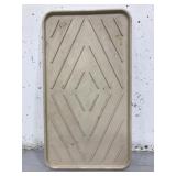 Tan plastic shoe floor tray