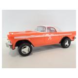 Vintage plastic orange pull string car