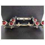 Vintage motor cycle tail lights piece