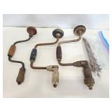 Three vintage handle drill and bits