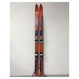 Orange 5 ft head sunburst skis